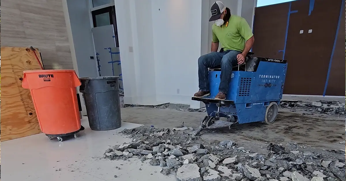 Three reasons to hire a professional demolition contractor in Southwest Florida. Featuring an Eco Demolitions employee riding a floor removal machine to tear up a tile floor in a Naples condominium.
