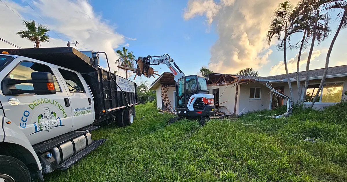 Eco Demolitions is transforming Southwest Florida with strategic demolition projects. Featuring a Bobcat backhoe demolishing an old and damaged house in Naples, neatly placing the debris in the nearby compact dumpster truck.