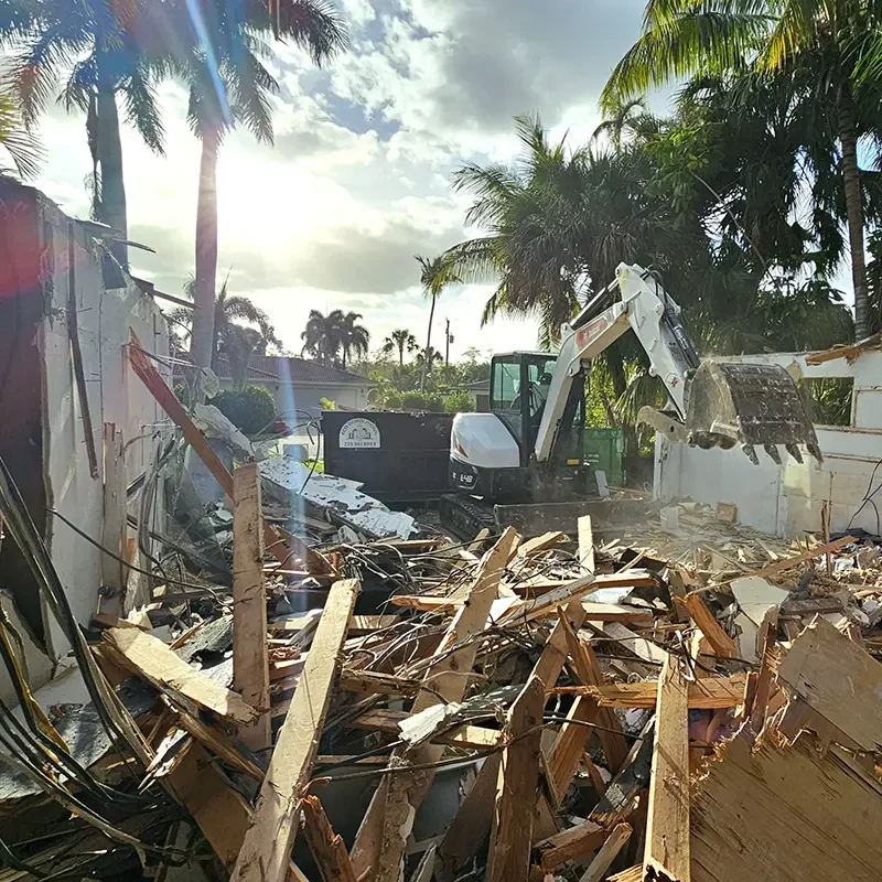 Photo of an active demolition in progress, featuring the complete demolition of a Florida house.